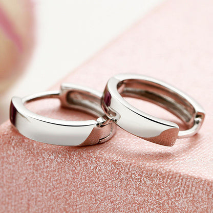 North & Pearl Polished Huggie Hoop Earrings product thumbnail 1